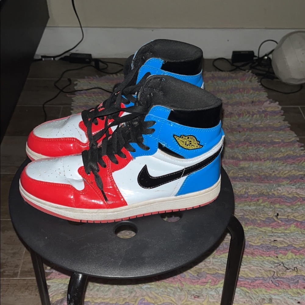 Black, white, blue, and red. Jordan 1s.